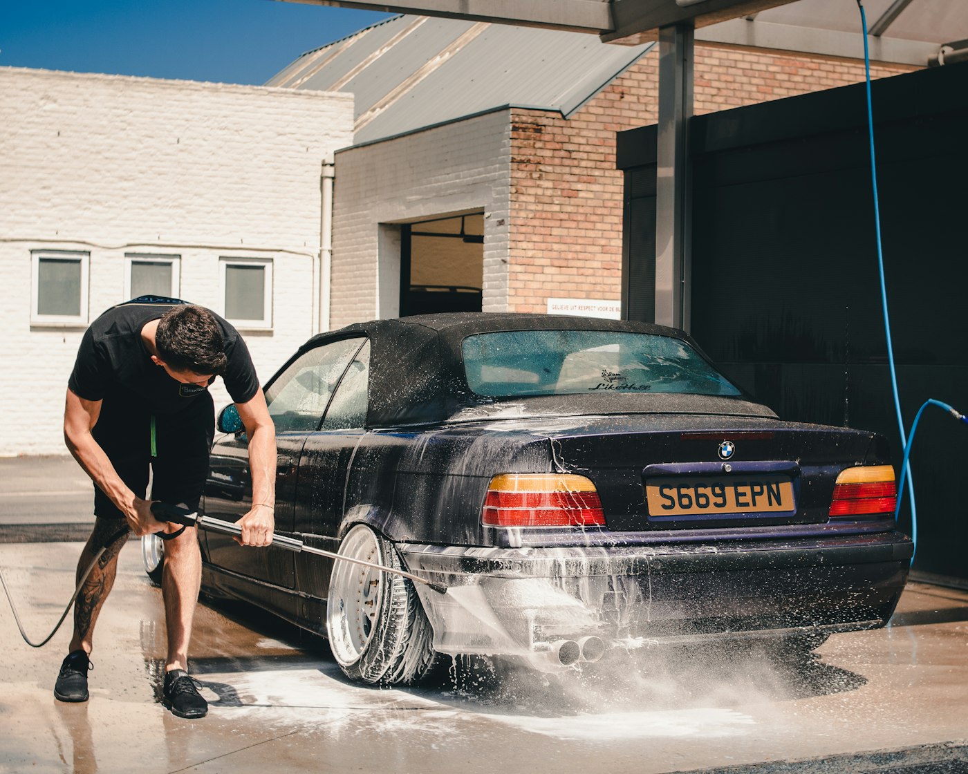 Freshly ceramic-coated car exterior with a deep glossy finish