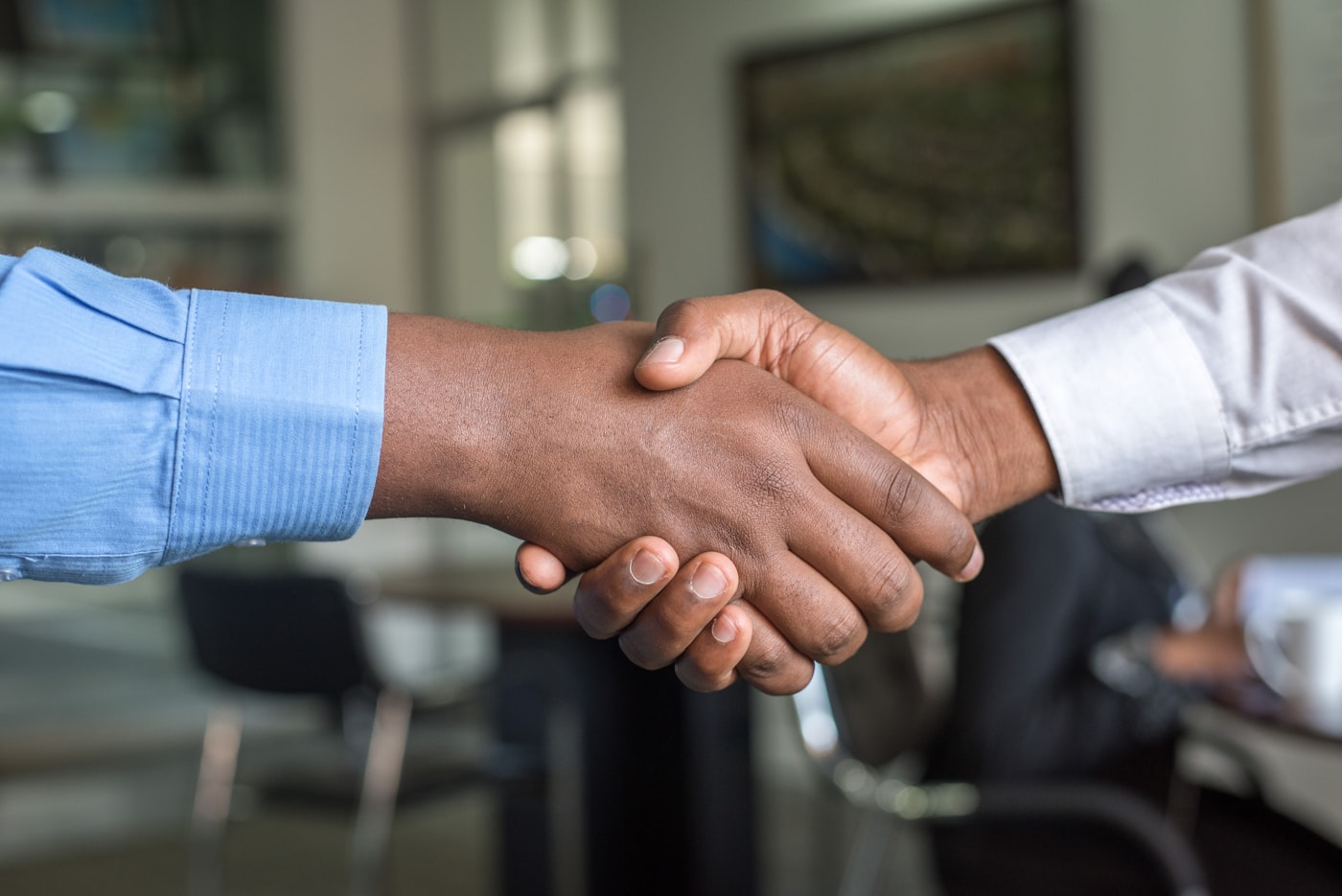 Professional consultation between advisor and client in a modern office